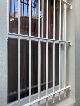 Bar grille in London Basement Bay Window.